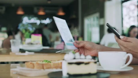 Customers are scanning the QR code to order food. Restaurants protect virus b Stock Footage 164231209