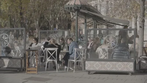 Customers are sitting in a café in Madrid, Spain Stock Footage 345029006
