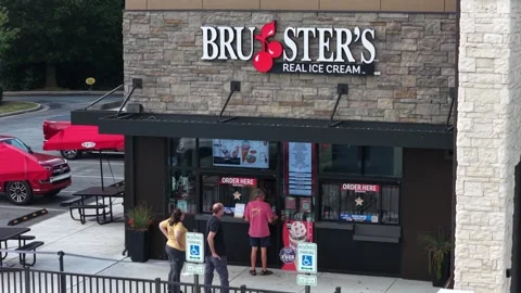 Customers at a Bruster's Real Ice Cream window 스톡 동영상 346105427