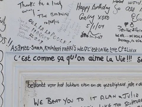 Customers comments on restaurant wall in Akaroa, New Zealand Stock Footage 93340808