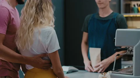 Customers couple making order or buying coffee beans Stock Footage 135074136