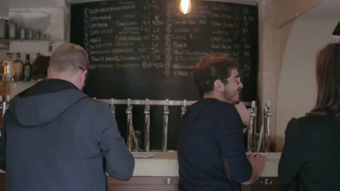 Customers Drinking Craft Beer On Bar Counter Stock Footage 344296388