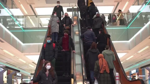 Customers go up and down the escalator in the store. Stock Footage 170116673