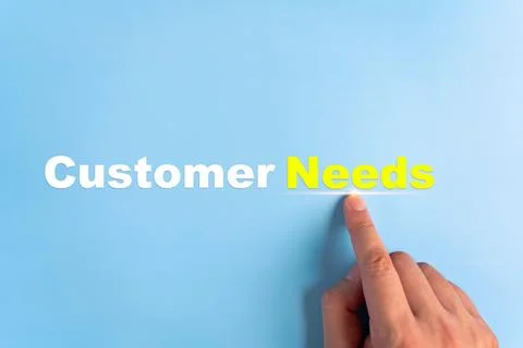 Customers needs concept. Hand pointing letter text in word need. Stock Photos
