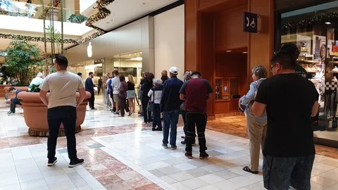 Customers outside Apple Store Stock Footage 98819622