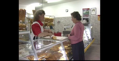 Customers purchasing bakery items at local store – Australia 1989 Stock Footage 318824071