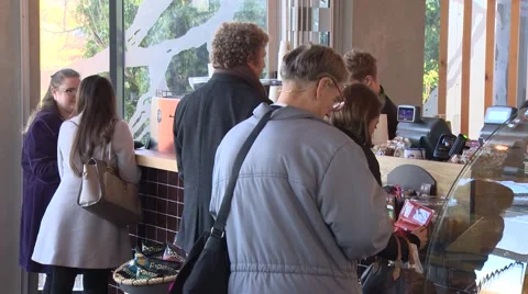 Customers queue at coffee shop Stock Footage 53304815
