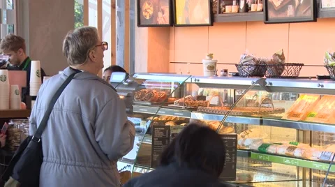 Customers queue at coffee shop Stock Footage 53304819