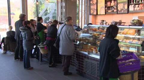 Customers queue at coffee shop Stock Footage 53304965