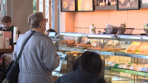 Customers queue at coffee shop Stock Footage 53305044