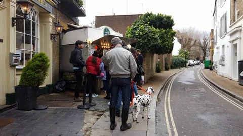 Customers queue for Crepes at La Creperie de Hampstead in Hampstead, London, UK Stock Footage 103092994