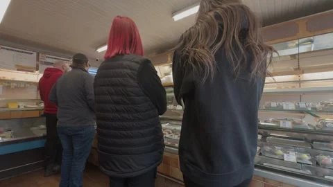 Customers Queuing for Lunch Service Inside Busy Local Bakery Shop Scene Stock Footage 332388357