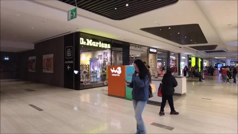 Customers rushing to do their shopping inside a shopping mall Stock Footage 295885482
