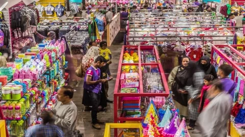Customers shopping in a store, top down view, slider timelapse Stock Footage 247155930