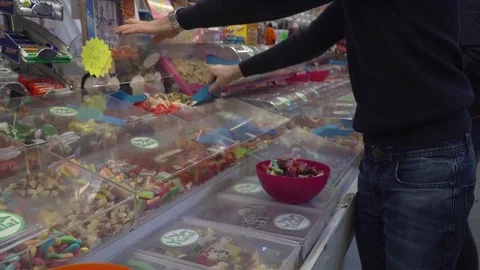 Customers shopping for sweets Stock Footage 84794063