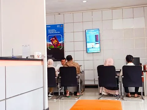 Customers Wait in Queue at BRI Indonesia Bank Customer Service Office Stock Photos