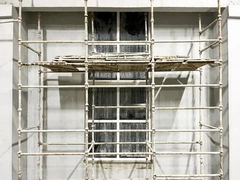 Customized scaffolding on windows for plastering walls Stock Photos
