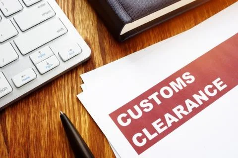 Customs clearance documents on an office table. Stock-Fotos
