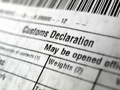 Customs declaration Customs declaration on a foreign packet parcel Copyrig... Stock Photos