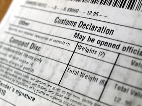 Customs declaration Customs declaration on a foreign packet parcel Copyrig... Stock Photos