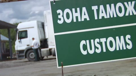 The customs officer checks documents at the driver of a waggon Stock Footage 7730730