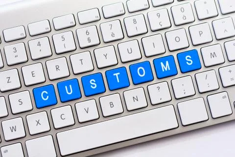 CUSTOMS writing on white keyboard Stock Photos