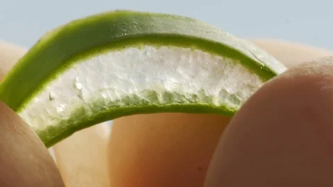 Cut aloe leaf, pulp, pulp, aloe jelly, close, extreme macro Stock Footage 108024469