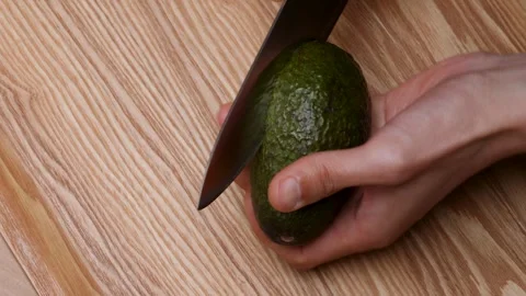 Cut the avocado. Stock Footage 295756968