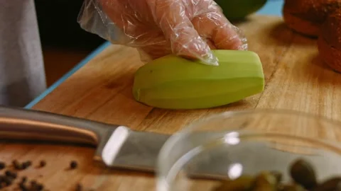 Cut into avocado slices. 4k video Stock Footage 164415252