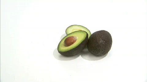 Cut Avocado spinning  Stock Footage 630551