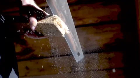 Cut the bar with a hacksaw. Stock Footage 157776829