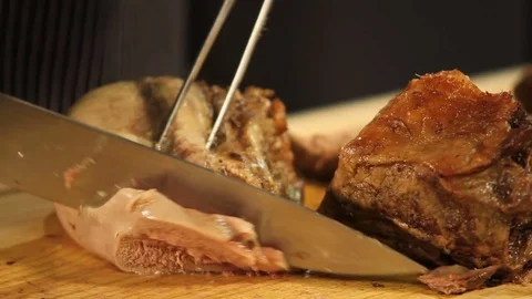 Cut beef in kitchen Video stock 76390876