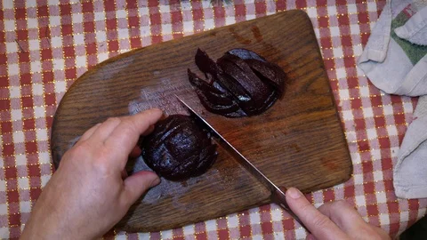 Cut Beetroot on Board with Knife. Cooking Salad at Home. Preparing Homemade Food Stockbeeldmateriaal 127779535