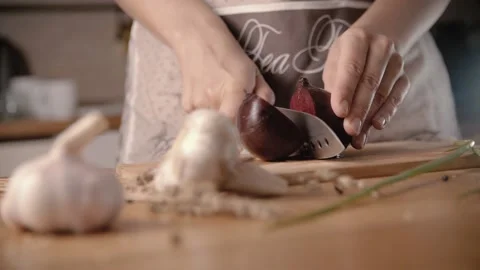 Cut beets with knife at kichen Stock Footage 140282312