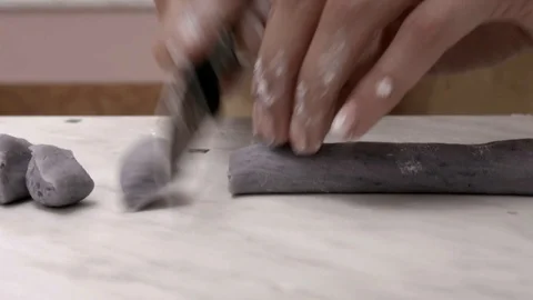 Cut black gnocchi Stock Footage 93730857