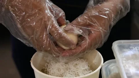 Cut boiled eggs into two pieces and put in a paper bowl to make soup 스톡 동영상 268515715