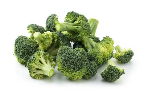 Cut broccoli placed on a white background Stock Photos