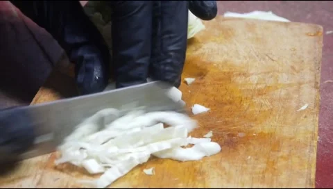 Cut the cabbage using a knife Stock Footage 313734517