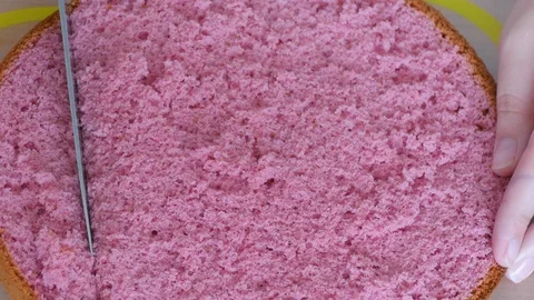 Cut off from the cake biscuit side making it rectangular Stock-Footage 123576825