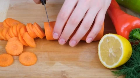 Cut carrot kitchen Stock Footage 233060029