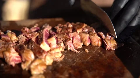 From Cut to Char: Capturing the Art of Meat Preparation for the Grill Stock Footage 236569997