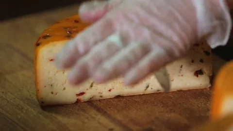 Cut the cheese into pieces Stock Footage 69221571