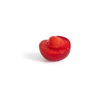 Cut cherry isolated on a white background. Closeup. Stock Photos