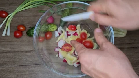 Cut Cherry Tomatoes In A Fresh Salad Stock-Footage 165505127