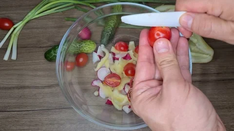 Cut Cherry Tomatoes In A Fresh Salad Stock Footage 165505133