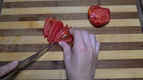 Cut Cherry Tomatoes With A Knife.  Video stock 157396798