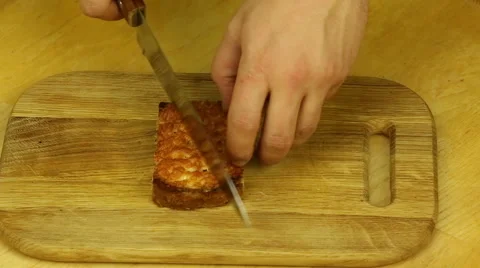 Cut croutons with a knife Stock Footage 66693852