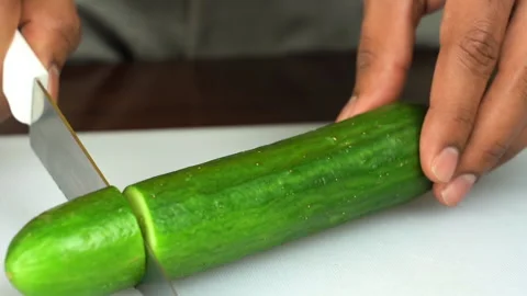 Cut cucumber on the board Video stock 135513603