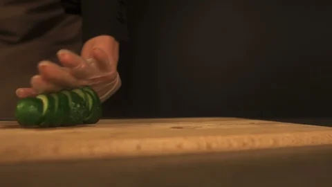 The cut cucumber rolls on the table Stock Footage 93963341