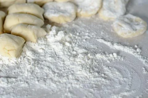 The cut dough to floured rolling. Making of pierogi with Cherry. Stock Photos